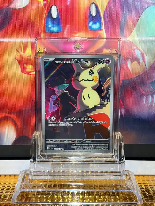 Team Rocket's Mimikyu Illustration Rare Pokémon card 238/217 illustrated by GOSSAN